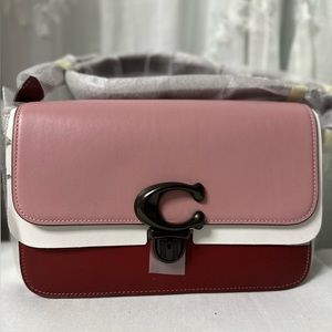 New, never worn with tags Coach crossbody bag